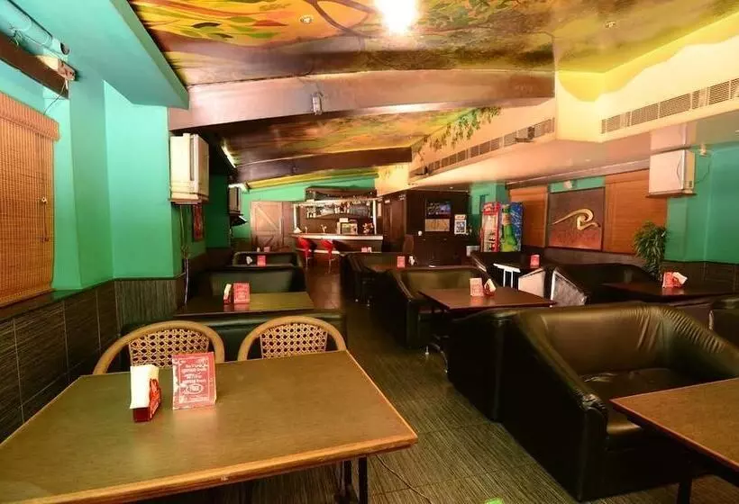 Hotel Capital O Grand Plaza