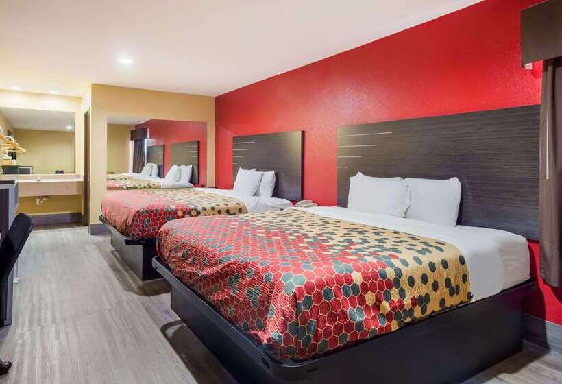 בית מלון כפרי Econo Lodge Lake Charles University Area