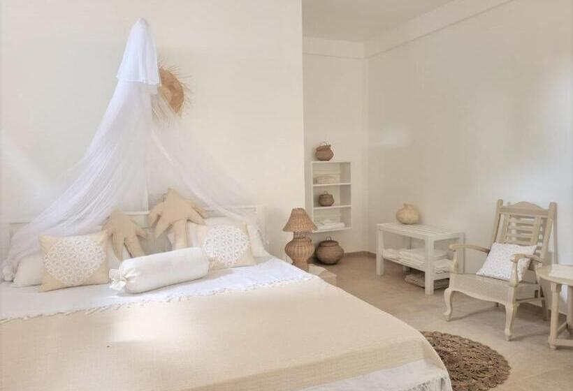 בית מלון כפרי Golden Beach Paradise