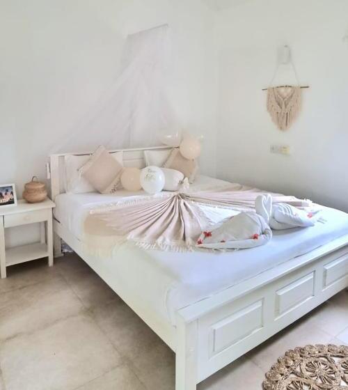 בית מלון כפרי Golden Beach Paradise