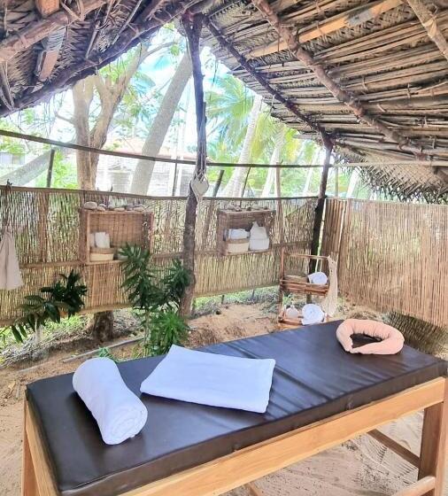 בית מלון כפרי Golden Beach Paradise