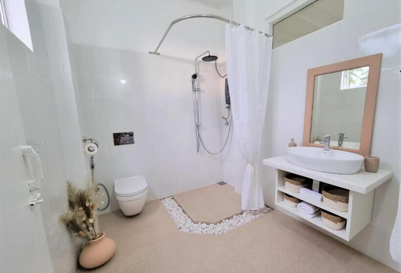 בית מלון כפרי Golden Beach Paradise