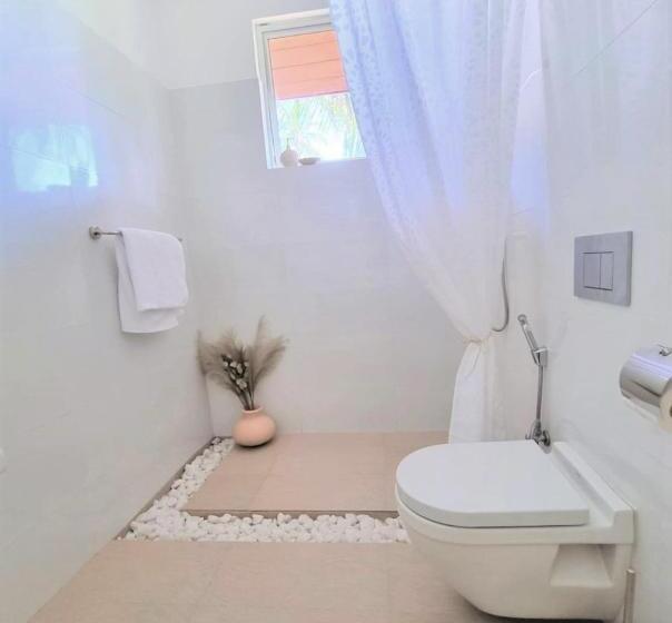 בית מלון כפרי Golden Beach Paradise