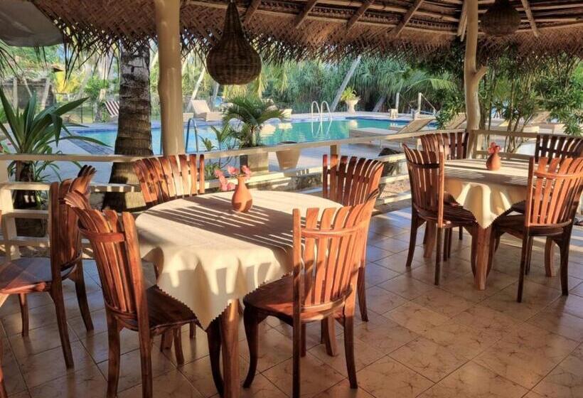 בית מלון כפרי Golden Beach Paradise