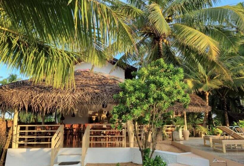 בית מלון כפרי Golden Beach Paradise