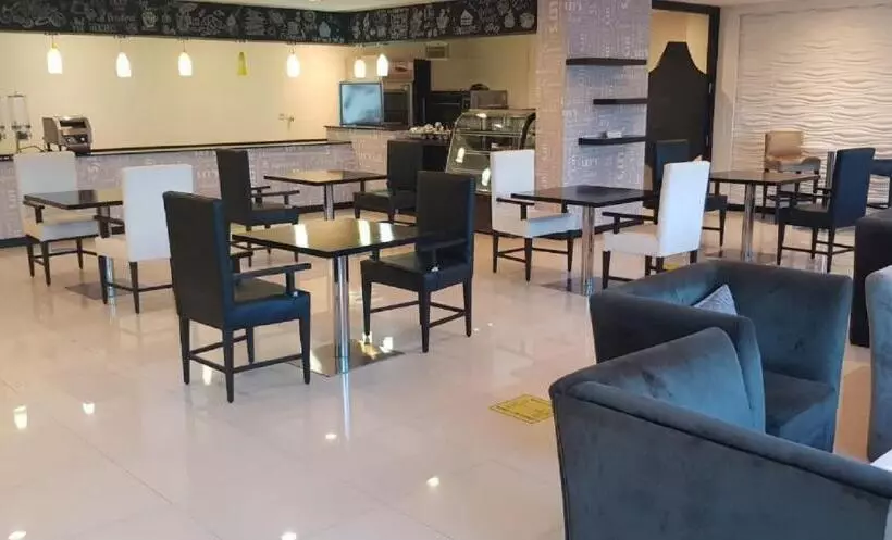 Tulip Hotel & Suites