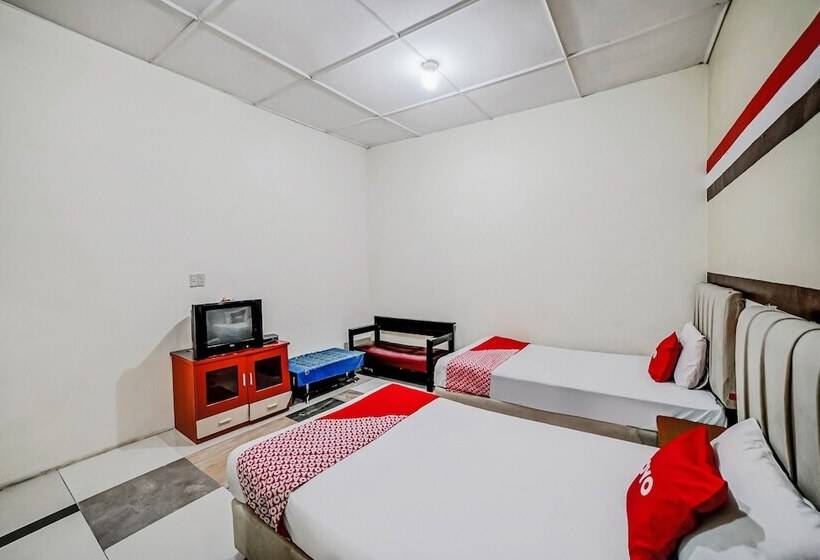 Отель Oyo 90980 Al Karim Syariah