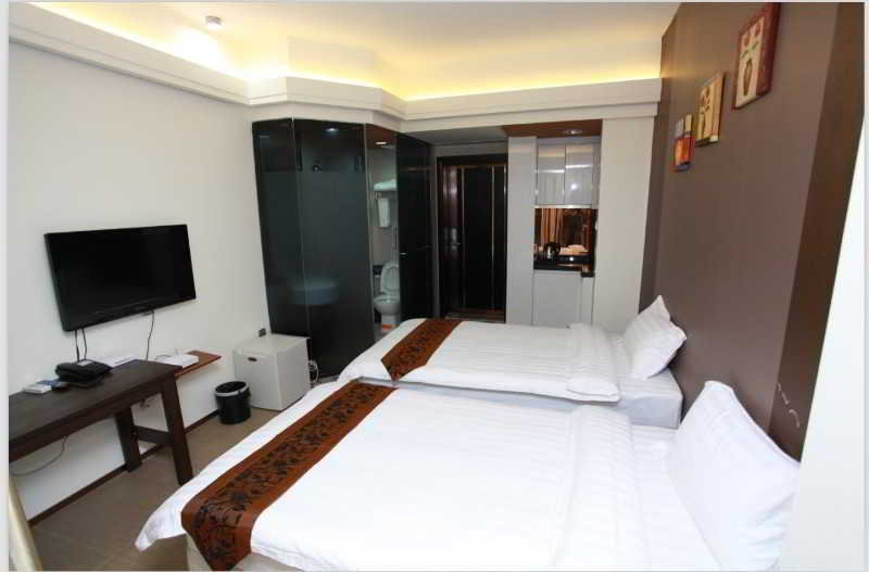 Отель Tengda Business