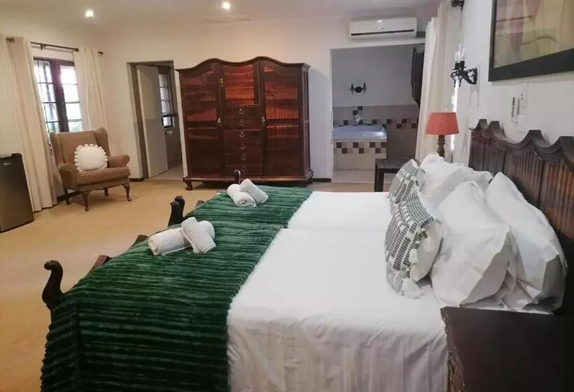 Отель Numbi & Garden Suites