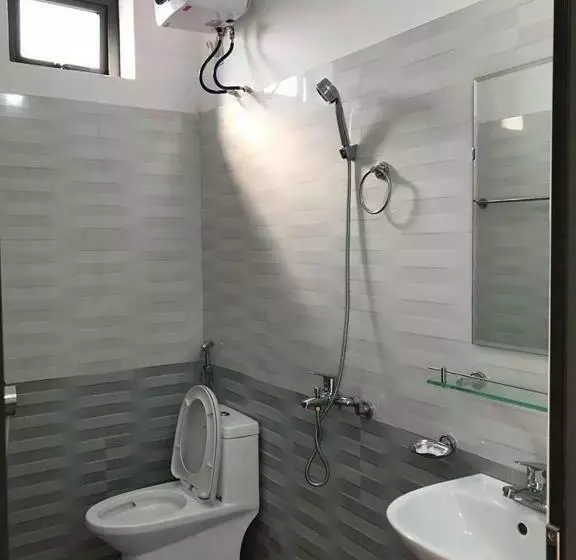 تختخواب و صبحانه Nhà Nghỉ Mạnh Bình