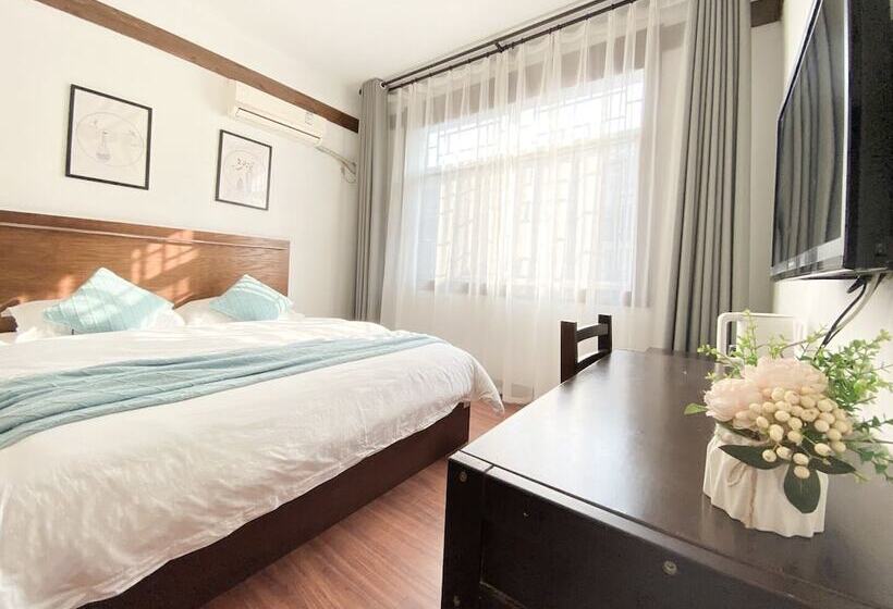 פנסיון Fenghuang Hemu House