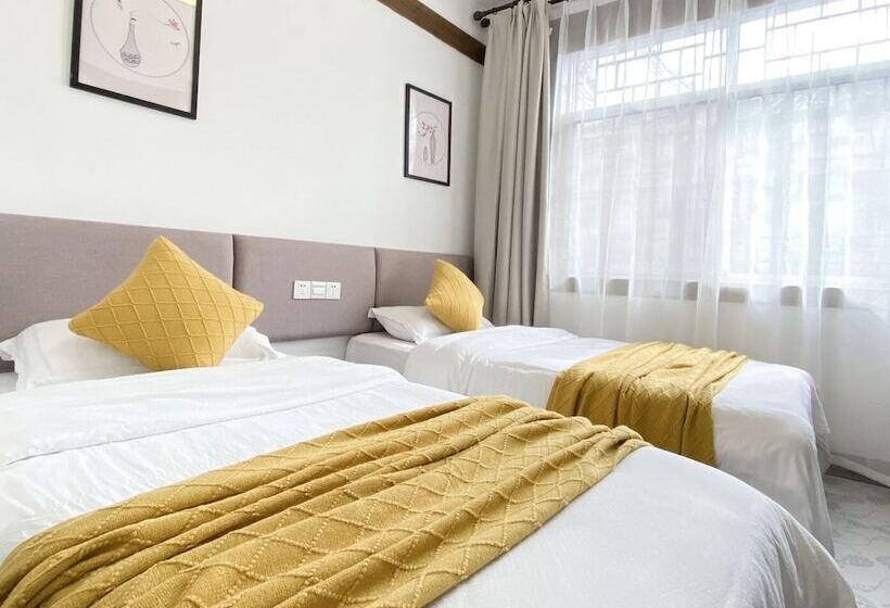 פנסיון Fenghuang Hemu House