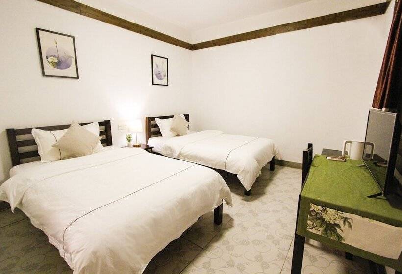 פנסיון Fenghuang Hemu House