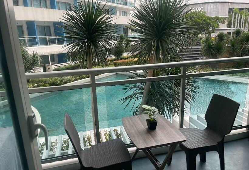 Azure 1br Apartment With Beach Pool Access Near Airport Pool View
