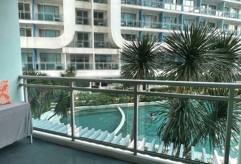 Azure 1br Apartment With Beach Pool Access Near Airport Pool View