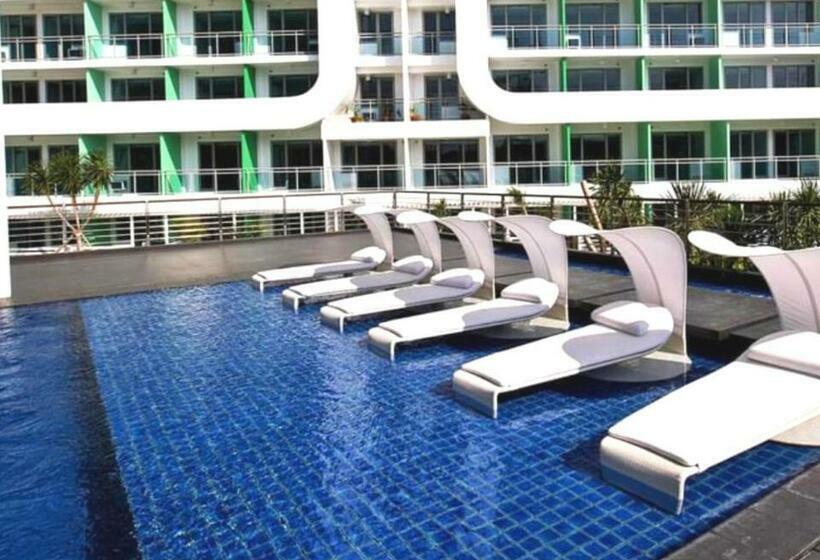 Azure 1br Apartment With Beach Pool Access Near Airport Pool View