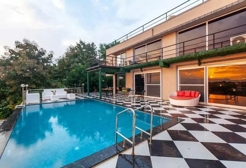 Stayvista S Vine & Splash Riverside Villa With An Infinity Pool And Indoor Games