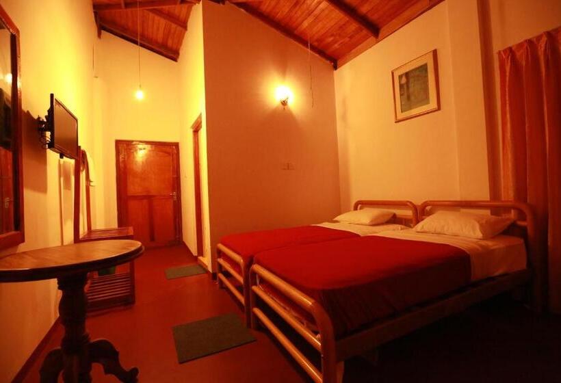 مبيت وإفطار Tea Garden Holiday Inn