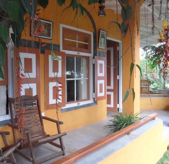 مبيت وإفطار Tea Garden Holiday Inn