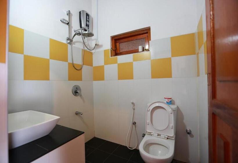 مبيت وإفطار Tea Garden Holiday Inn