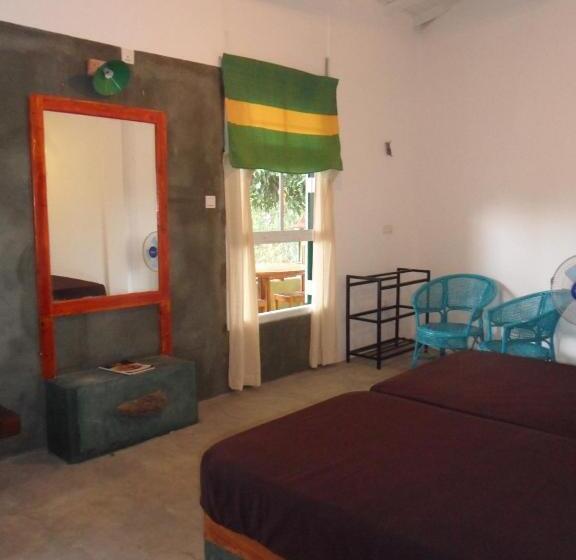 مبيت وإفطار Tea Garden Holiday Inn