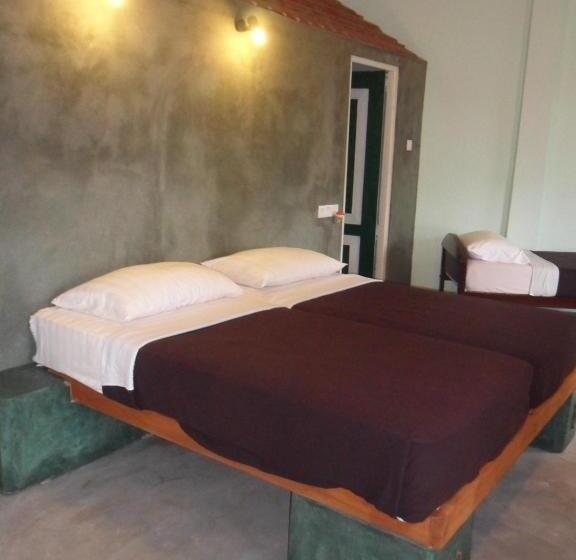 مبيت وإفطار Tea Garden Holiday Inn