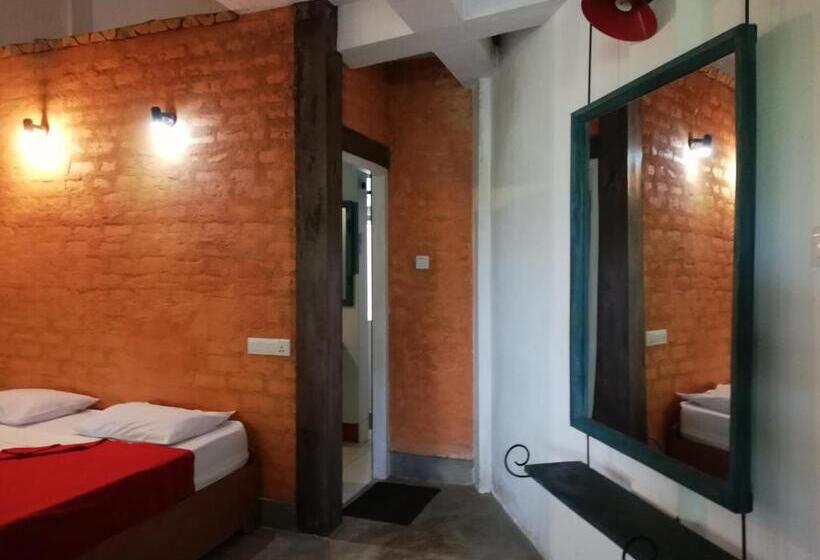 مبيت وإفطار Tea Garden Holiday Inn