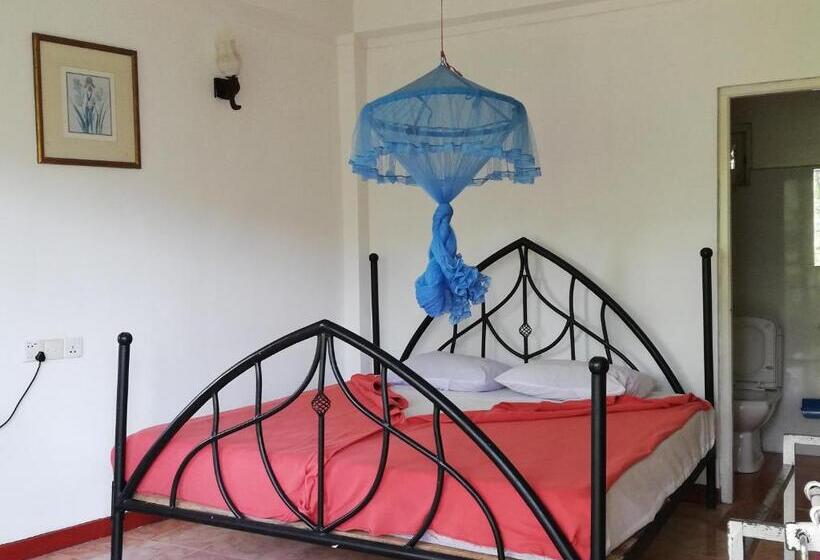 مبيت وإفطار Tea Garden Holiday Inn