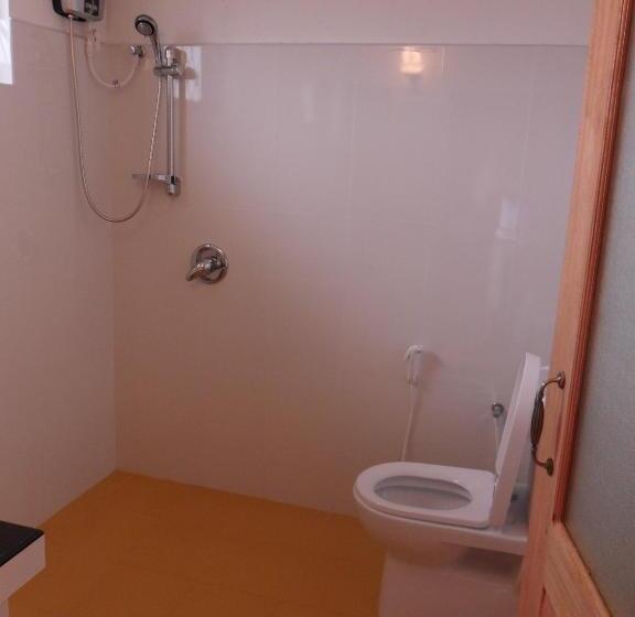 مبيت وإفطار Tea Garden Holiday Inn