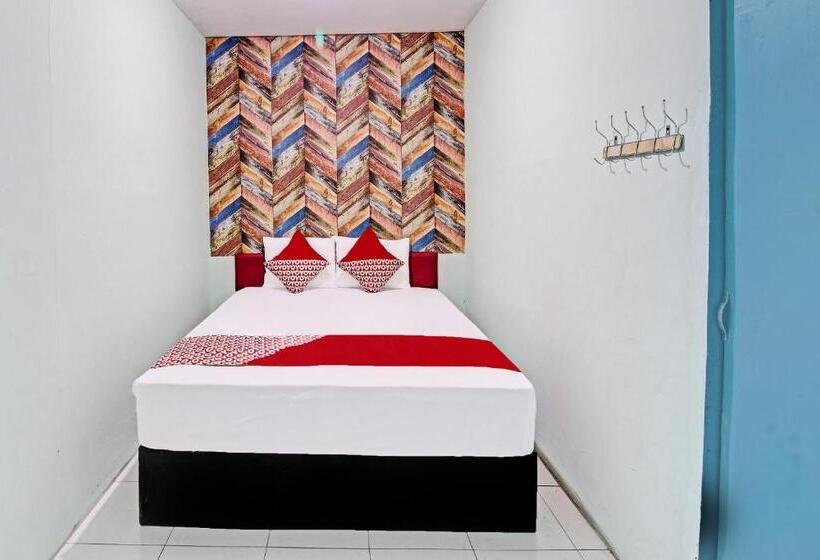 فندق Oyo 92032 Utama  & Karaoke