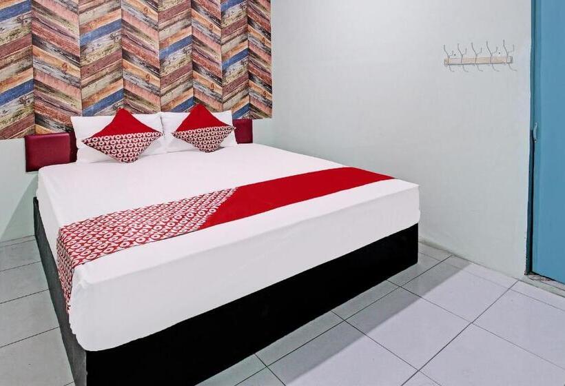 فندق Oyo 92032 Utama  & Karaoke