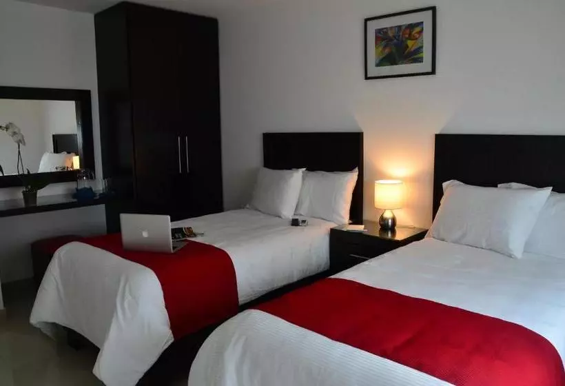 Отель Clamont Suites