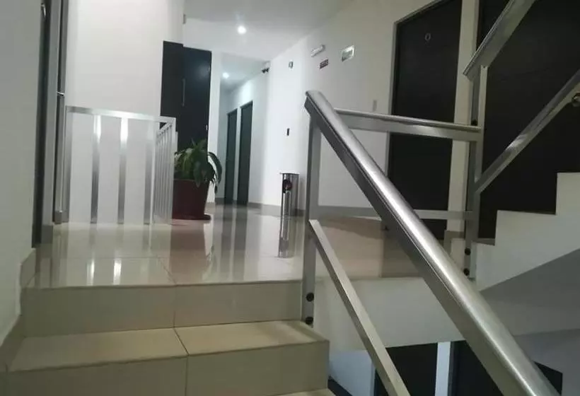 Отель Clamont Suites