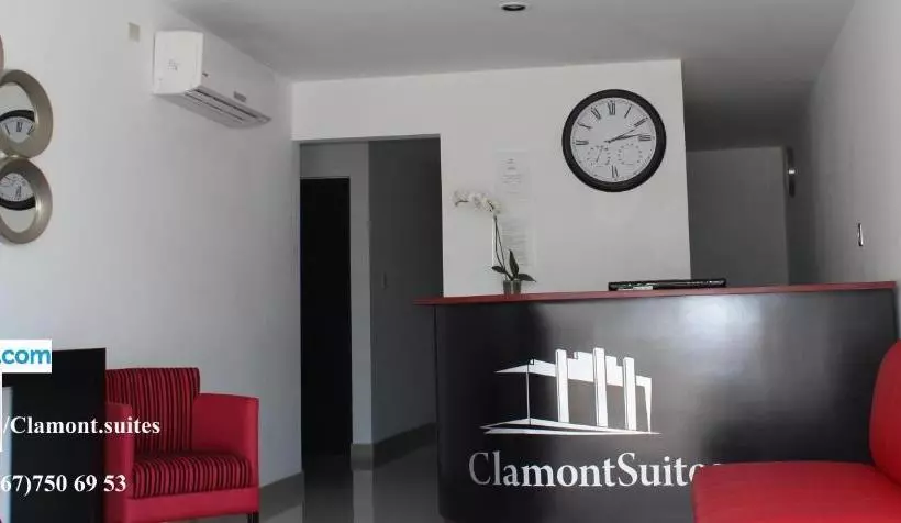 Отель Clamont Suites