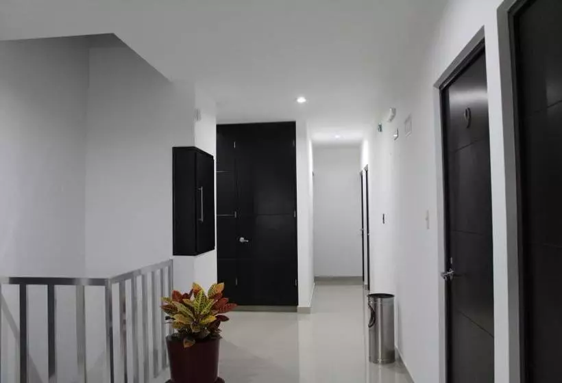 Отель Clamont Suites