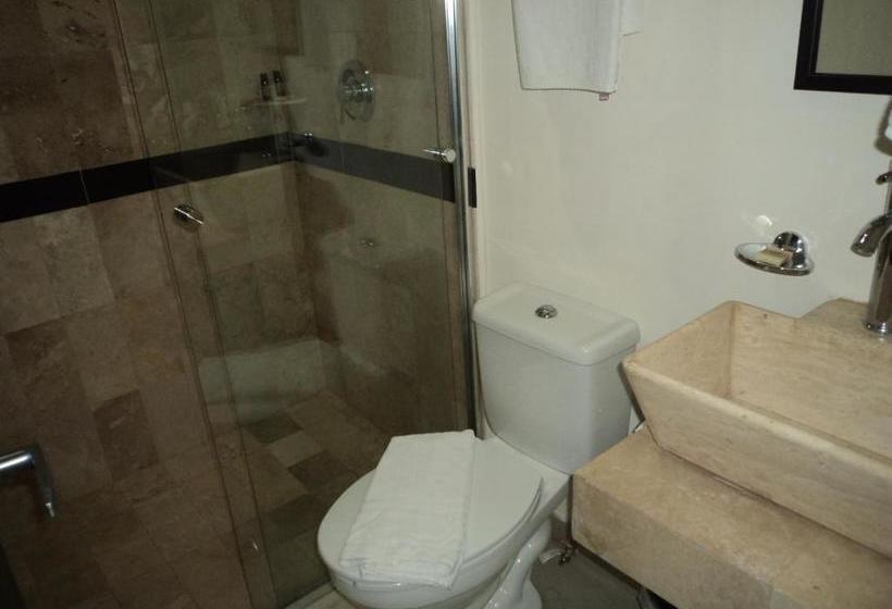 Отель Clamont Suites