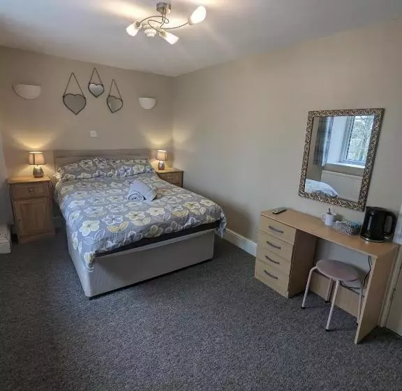 בית מלון כפרי Prestleigh Inn