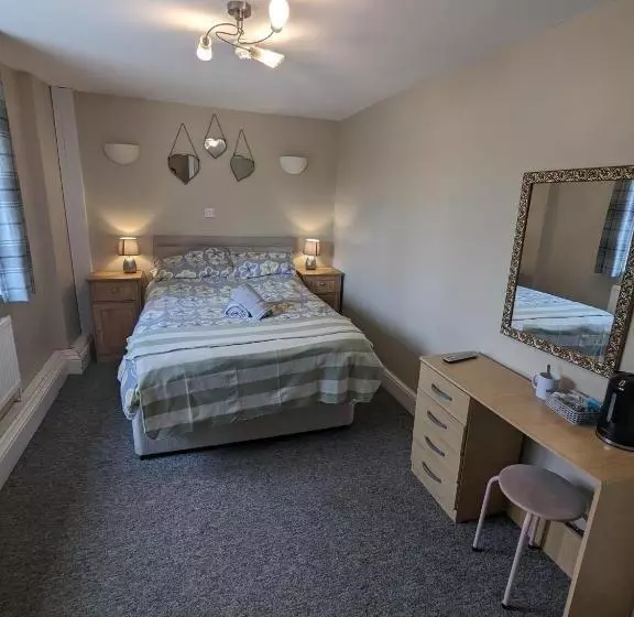 בית מלון כפרי Prestleigh Inn