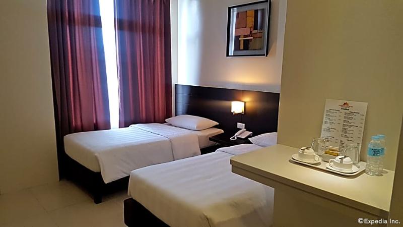 酒店 Manhattan Suites Inn