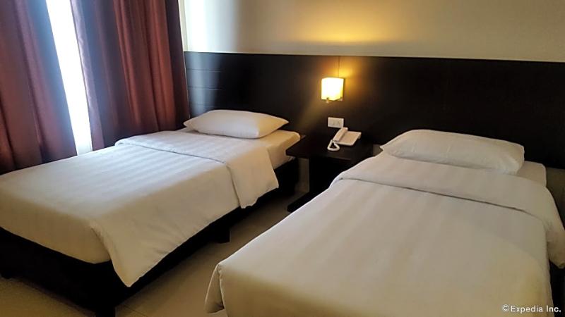 酒店 Manhattan Suites Inn