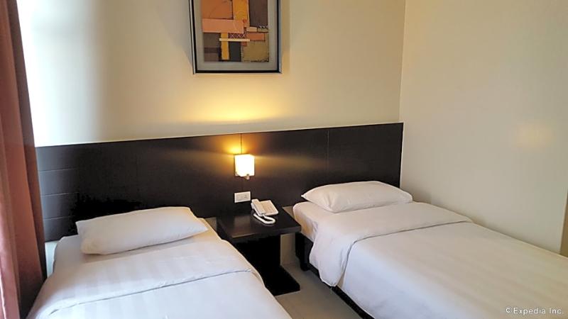 酒店 Manhattan Suites Inn