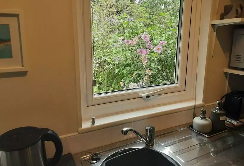 Tranquil Wood Cabin Set In A Beautiful Orchard