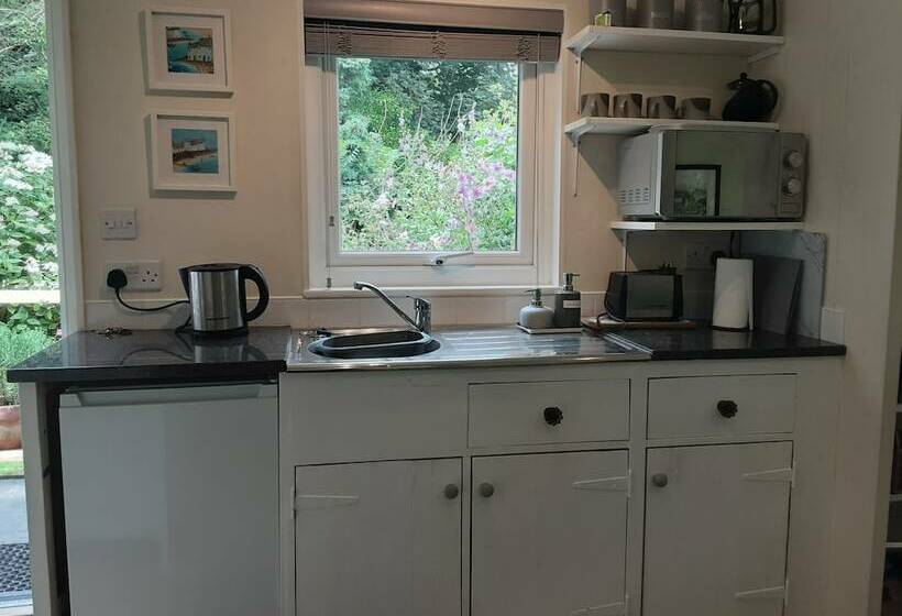 Tranquil Wood Cabin Set In A Beautiful Orchard