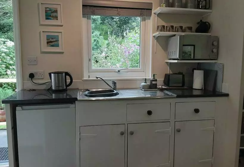 Tranquil Wood Cabin Set In A Beautiful Orchard