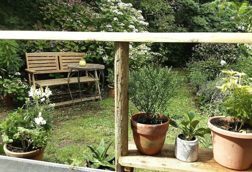 Tranquil Wood Cabin Set In A Beautiful Orchard