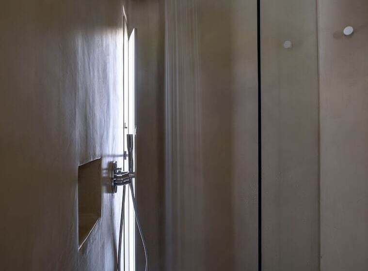 Отель Santopaz Suites