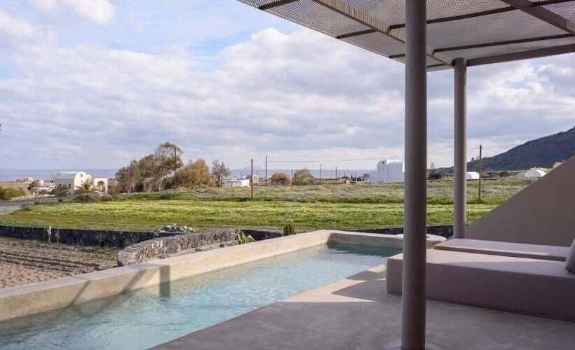 Отель Santopaz Suites