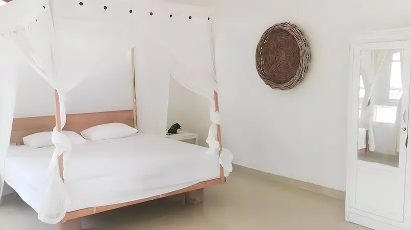 Retkeilymaja The Village Rua Beach Homestay