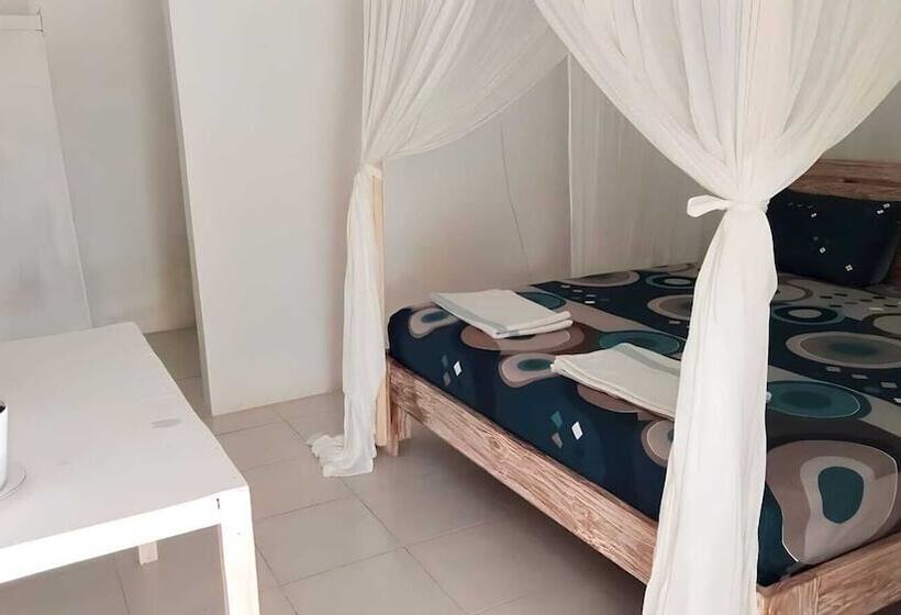 호스텔 The Village Rua Beach Homestay