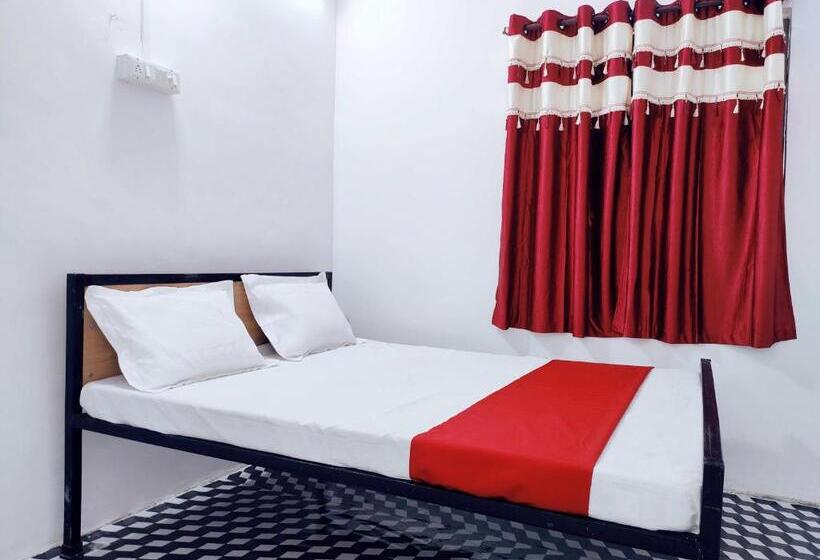 Spot On 80770j Hotel Relax Inn